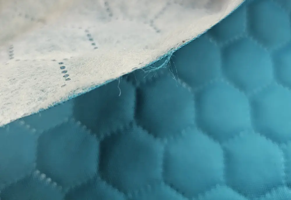 Zateplená tyrkysová kočárkovina