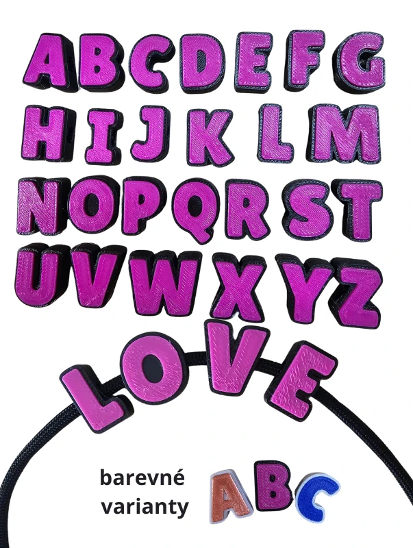 Písmenko Magenta na černé