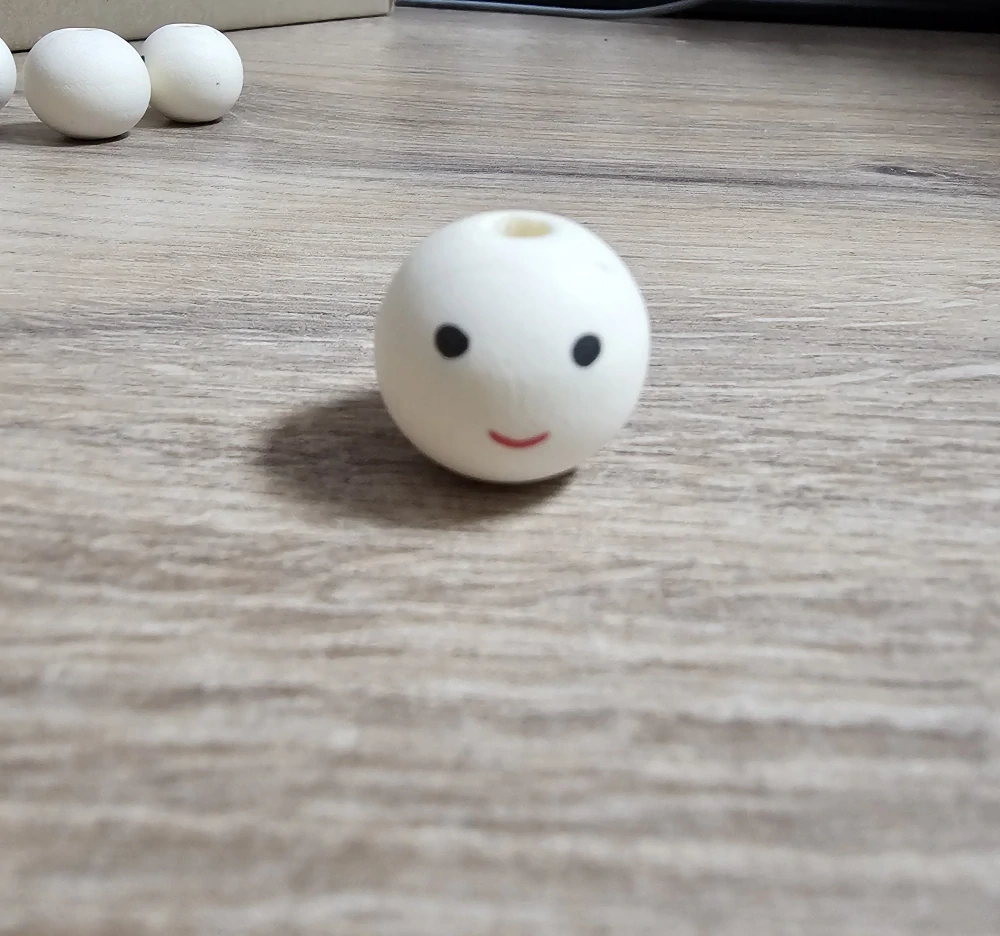 Dřevěné korálky s obličejem Ø20 mm
